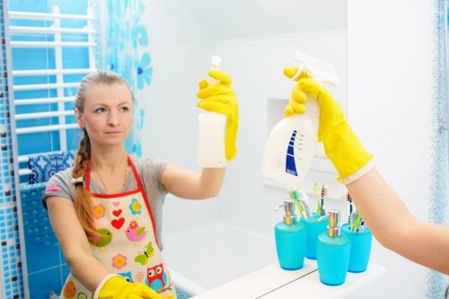 Local cleaners preparing a flat for handover in West Kensington