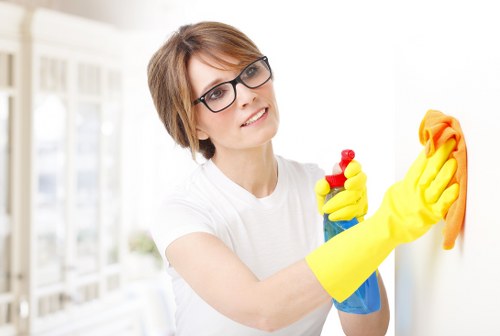 Deep cleaning a fabric sofa in a West Kensington home