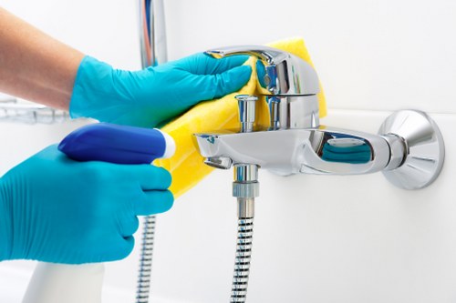 Local cleaner preparing a guest-ready rental in West Kensington