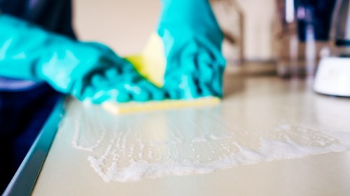 Preparing hard flooring for deep cleaning in West Kensington